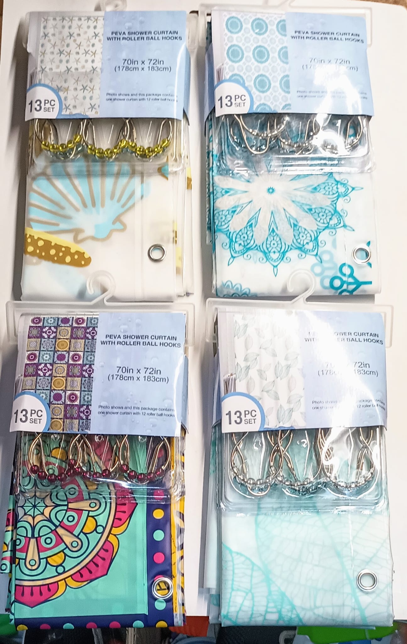 PEVA SHOWER CURTAIN WTIH ROLLER BALL.————— $8.99