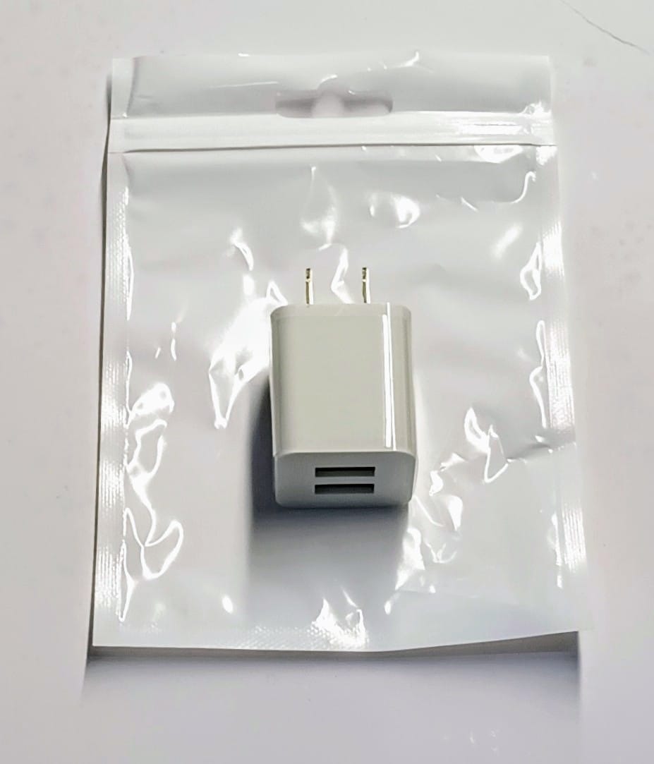 CHARGER DUAL HOME.——————— $4.99