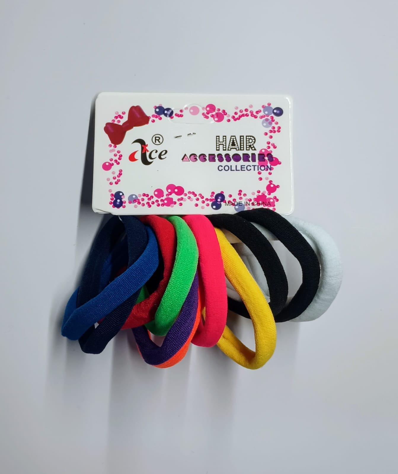 GOMA DE PELO COLORS $1.99-1.00 ($12x1 DZ