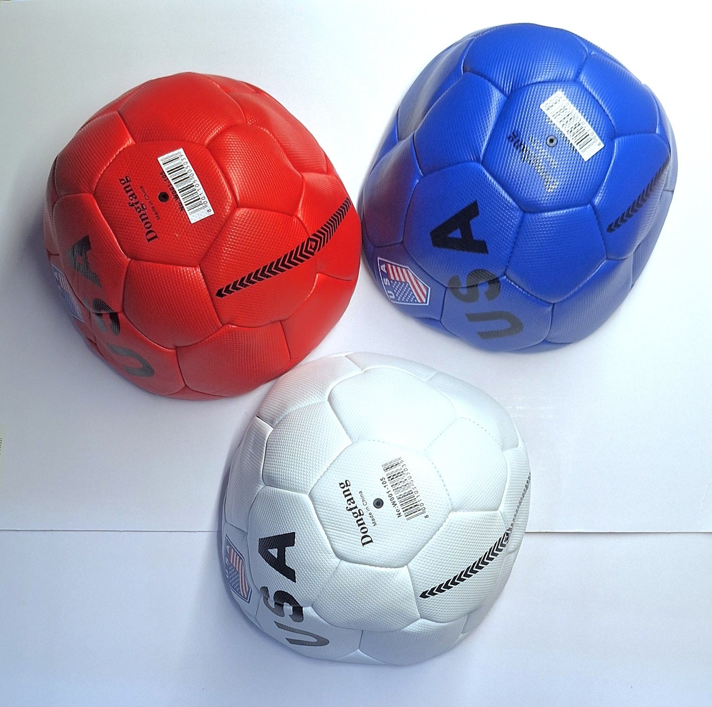 SOCCER BALL RED, WHITE, BLUE.   (# WOO1-105). —————$14.99